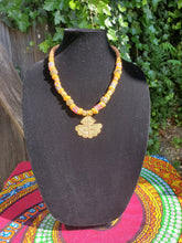 African brass pendant necklace