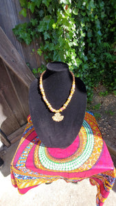 African brass pendant necklace