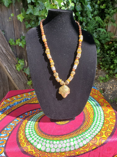 African brass pendant