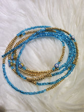 Light blue evil eye waist beads