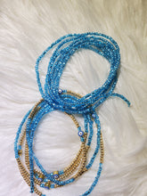 Light blue evil eye waist beads