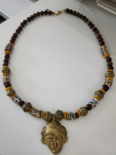 African brass pendant